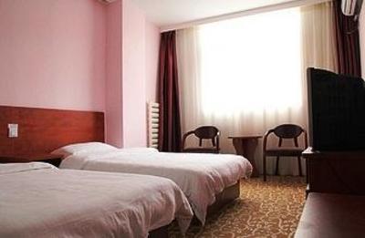 фото отеля Yijia Business Hotel Qingdao