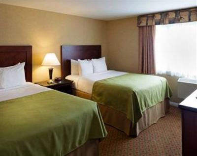 фото отеля Pacific Host Inn & Suites