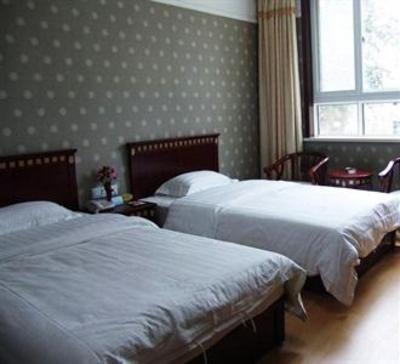 фото отеля Sunshine Mansion Jiaozhou