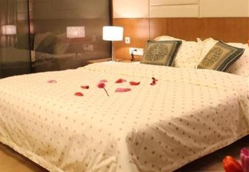 фото отеля Yiju Zhumeila International Apartment