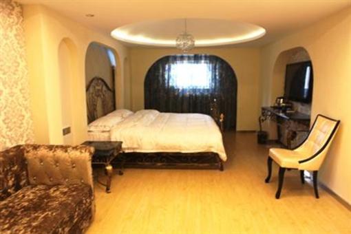 фото отеля Chuangyi Shishang Business Hotel Minjiang Qingdao