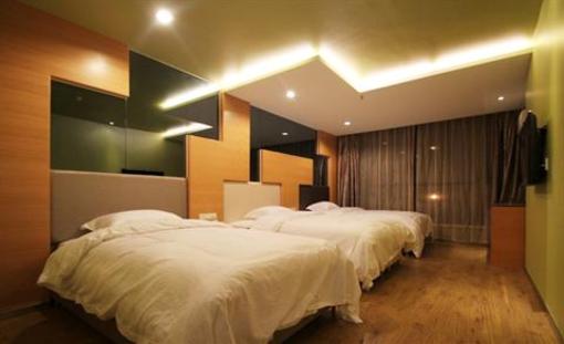 фото отеля Chuangyi Shishang Business Hotel Minjiang Qingdao