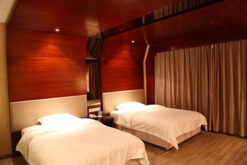 фото отеля Chuangyi Shishang Business Hotel Minjiang Qingdao