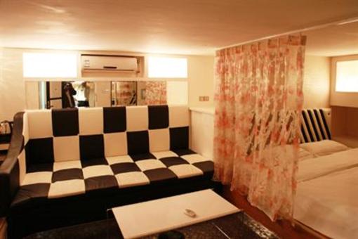 фото отеля Chuangyi Shishang Business Hotel Minjiang Qingdao