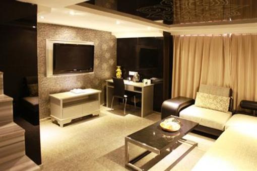 фото отеля Chuangyi Shishang Business Hotel Minjiang Qingdao