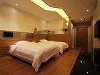 фото отеля Chuangyi Shishang Business Hotel Minjiang Qingdao