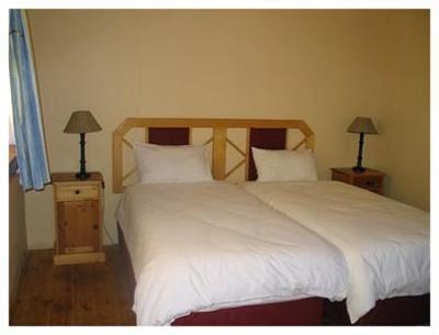 фото отеля Mountain Manor Back Packers Lodge