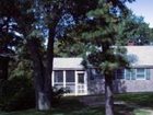 фото отеля Pine Shore Cottages