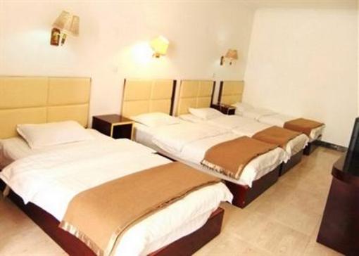 фото отеля Zhuoma Youth Hostel