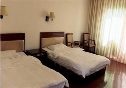 фото отеля Zhuoma Youth Hostel