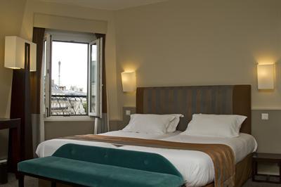 фото отеля Emeraude Hotel Plaza Etoile