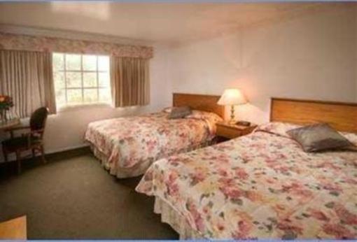 фото отеля Deer Haven Inn & Suites