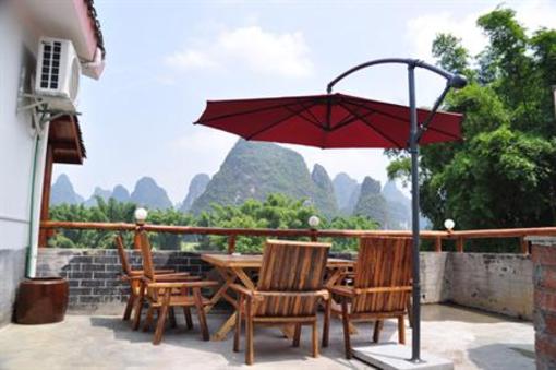 фото отеля Yangshuo Phoenix Pagoda Fonglou Retreat