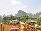 фото отеля Yangshuo Phoenix Pagoda Fonglou Retreat