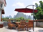 фото отеля Yangshuo Phoenix Pagoda Fonglou Retreat