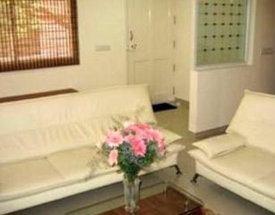 фото отеля Aranha Homes - Trinity Grand