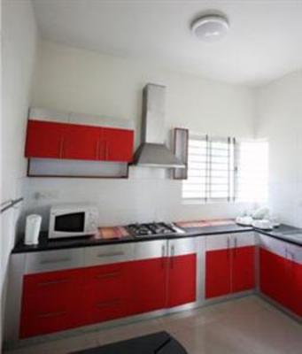 фото отеля Aranha Homes - Trinity Grand