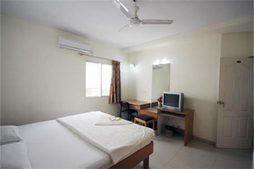 фото отеля Aranha Homes - Trinity Grand