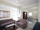 фото отеля Aranha Homes - Trinity Grand