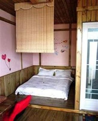 фото отеля Longtou Cabin Family Hotel - Xiamen