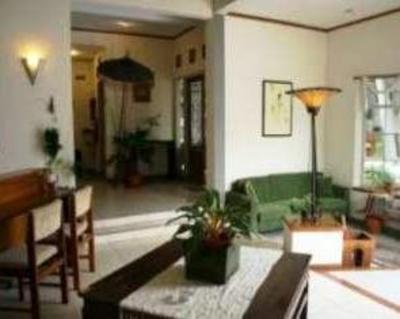 фото отеля Rumah Asri Guest House