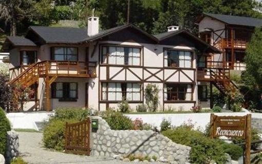 фото отеля Reencuentro Apart Bungalows