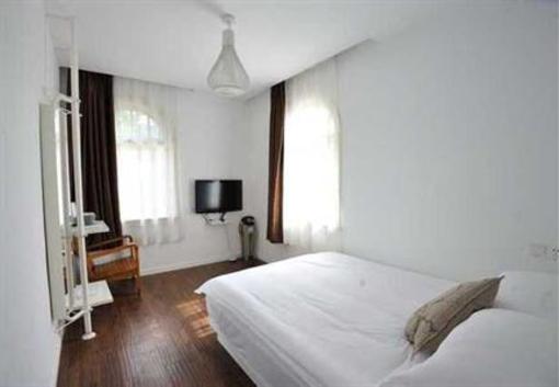 фото отеля Qingnianhui Youth Hostel