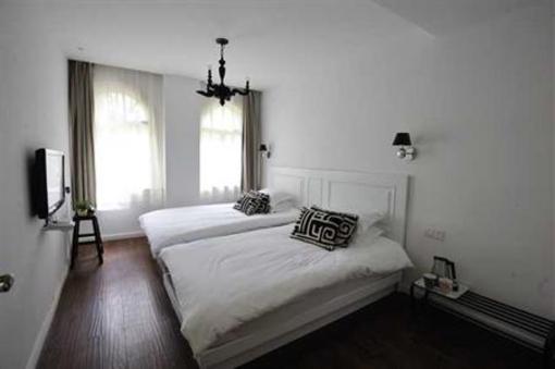 фото отеля Qingnianhui Youth Hostel