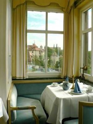 фото отеля Gastehaus Goldener Hirsch Rothenburg