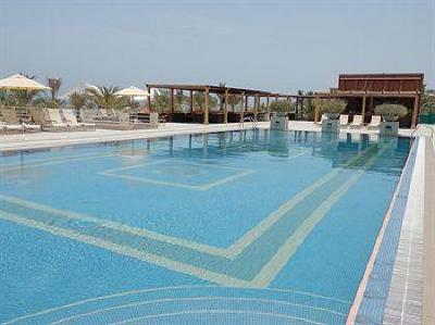 фото отеля Al Hamra Palace Beach Resort