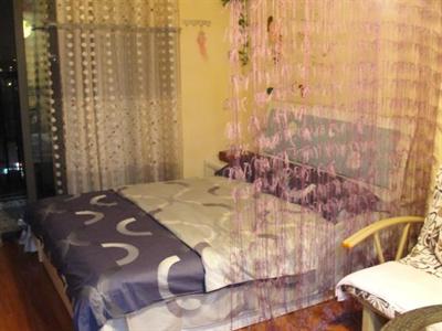 фото отеля Freeport Apartment Hotel Wujialing