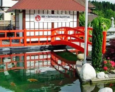 фото отеля Hotel Restaurant Koi-Gartenteich Hausernmoos
