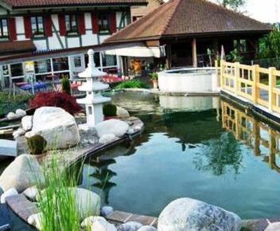 фото отеля Hotel Restaurant Koi-Gartenteich Hausernmoos
