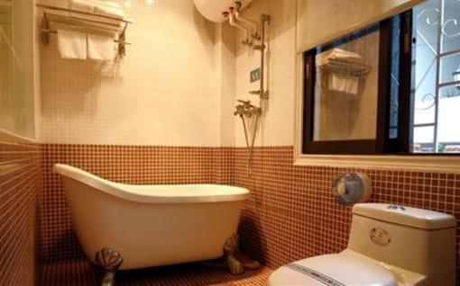 фото отеля Red Bricks Family Inn