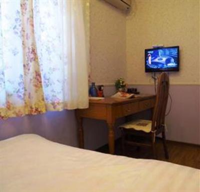 фото отеля Red Bricks Family Inn