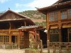 фото отеля Lijiang Apu Tourist House