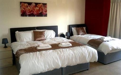 фото отеля Harman Holiday Apartments