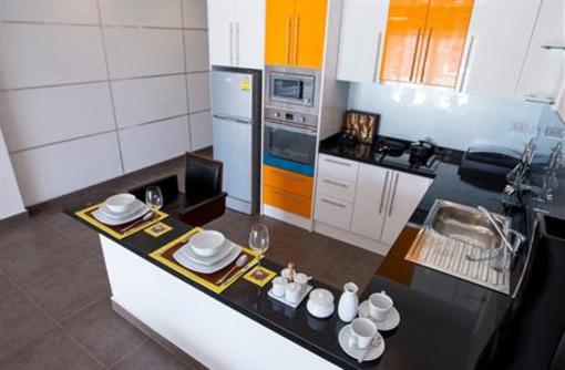 фото отеля Tudor Court Serviced Apartments