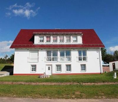 фото отеля Apartmenthaus Am Grun