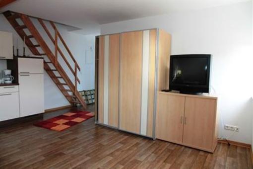 фото отеля Apartmenthaus Am Grun
