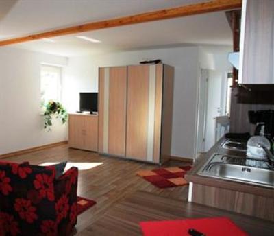 фото отеля Apartmenthaus Am Grun