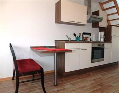 фото отеля Apartmenthaus Am Grun