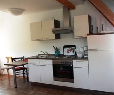 фото отеля Apartmenthaus Am Grun