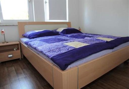 фото отеля Apartmenthaus Am Grun