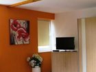 фото отеля Apartmenthaus Am Grun