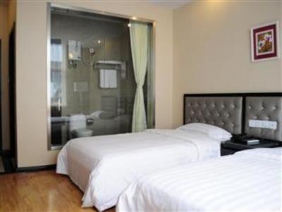 фото отеля Qingdao Sheng Shi Business Hotel