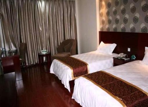 фото отеля Green Tree Inn Jiuquan Century Plaza Hotel
