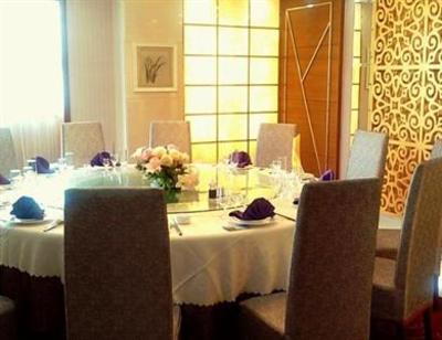 фото отеля Green Tree Inn Jiuquan Century Plaza Hotel