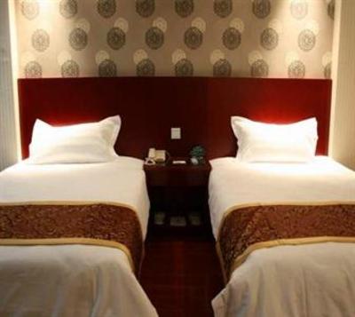 фото отеля Green Tree Inn Jiuquan Century Plaza Hotel