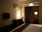 фото отеля Green Tree Inn Jiuquan Century Plaza Hotel